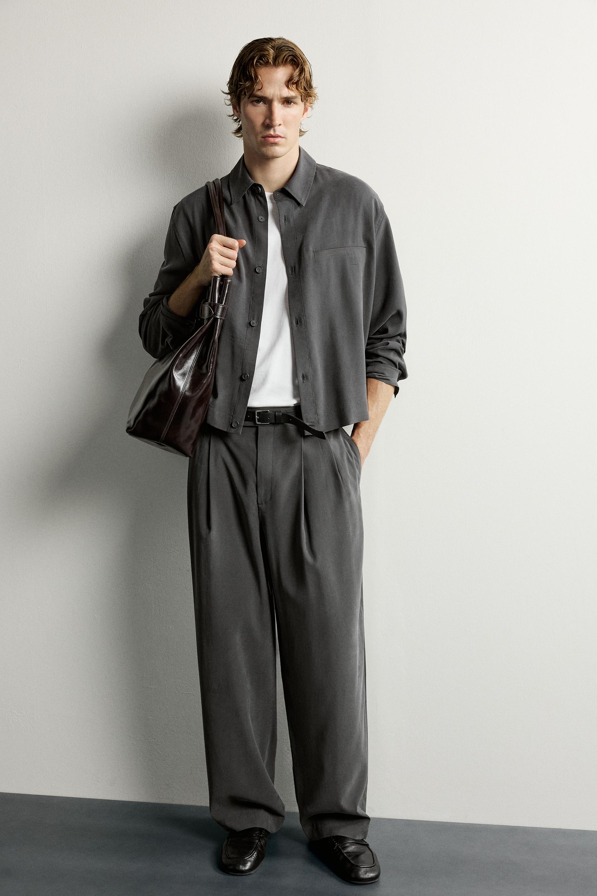 RELAXED FIT PLEATED PANTS
